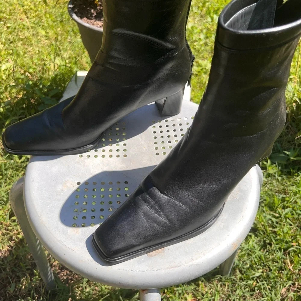 Stuart Weitzman7.5AA, rear zip closure, Black leather2.25” heel booties,